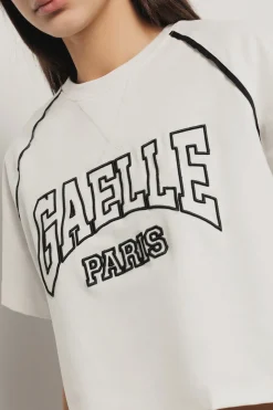 T-Shirt^Gaëlle T shirt crop paricollo raglan con inserti profilo • - Paris Bianco