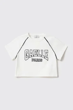 T-Shirt^Gaëlle T shirt crop paricollo raglan con inserti profilo • - Paris Bianco